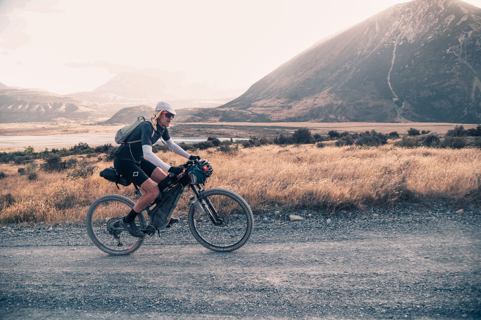 Matt Quirk riding a bike in the mountains near Wānaka